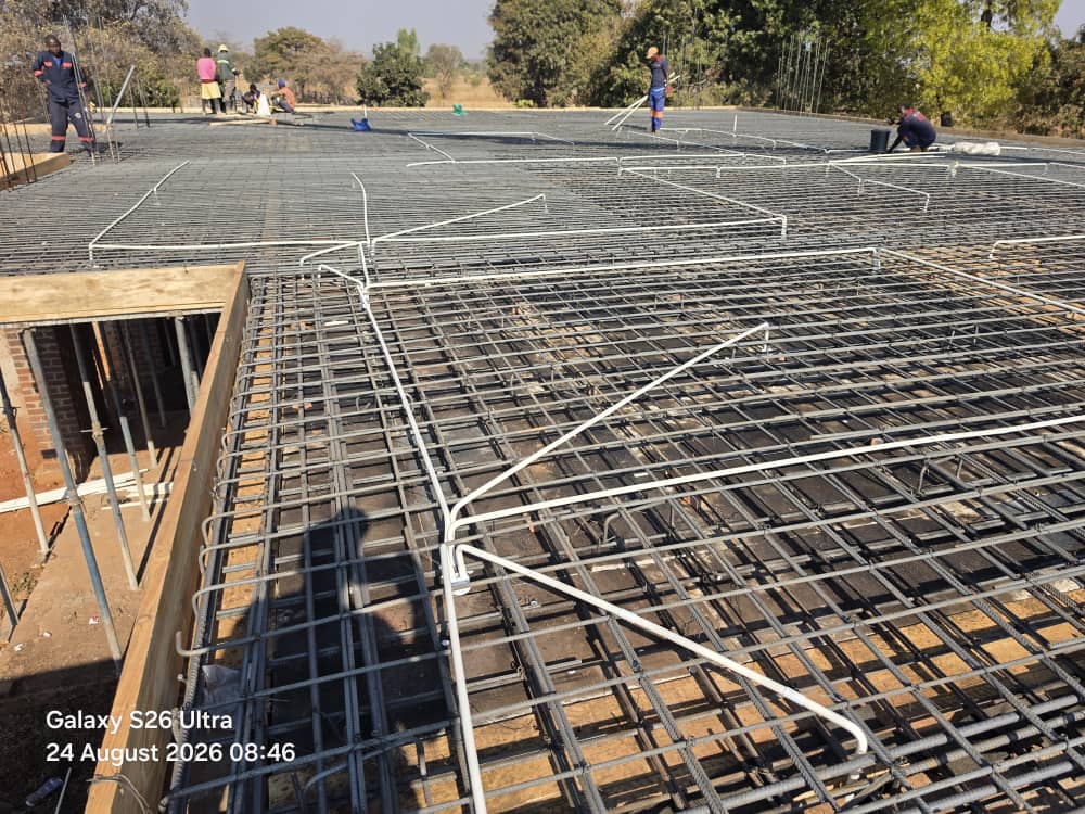 Electrical conduit installed before concrete slab casting